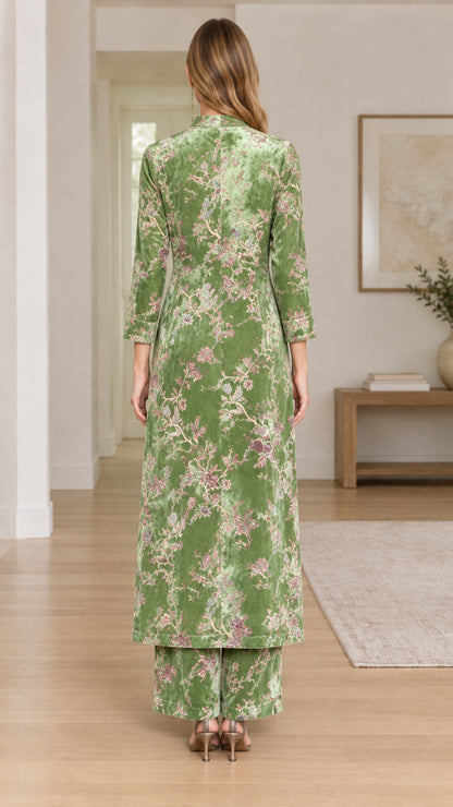 Back view of model wearing Sage Green floral velvet long tunic and pants