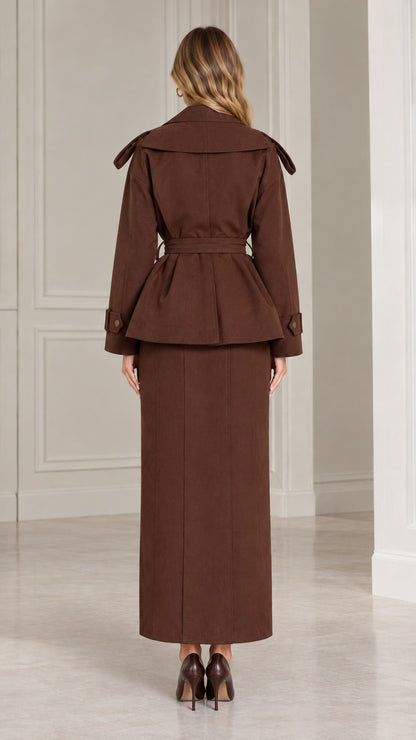 Back view of chocolate brown belted jacket and long skirt suit