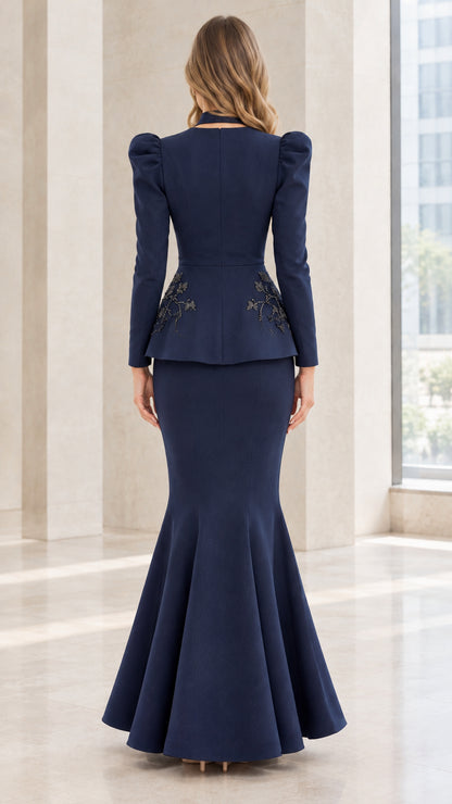 Back view of model in Navy Blue long sleeve formal evening gown