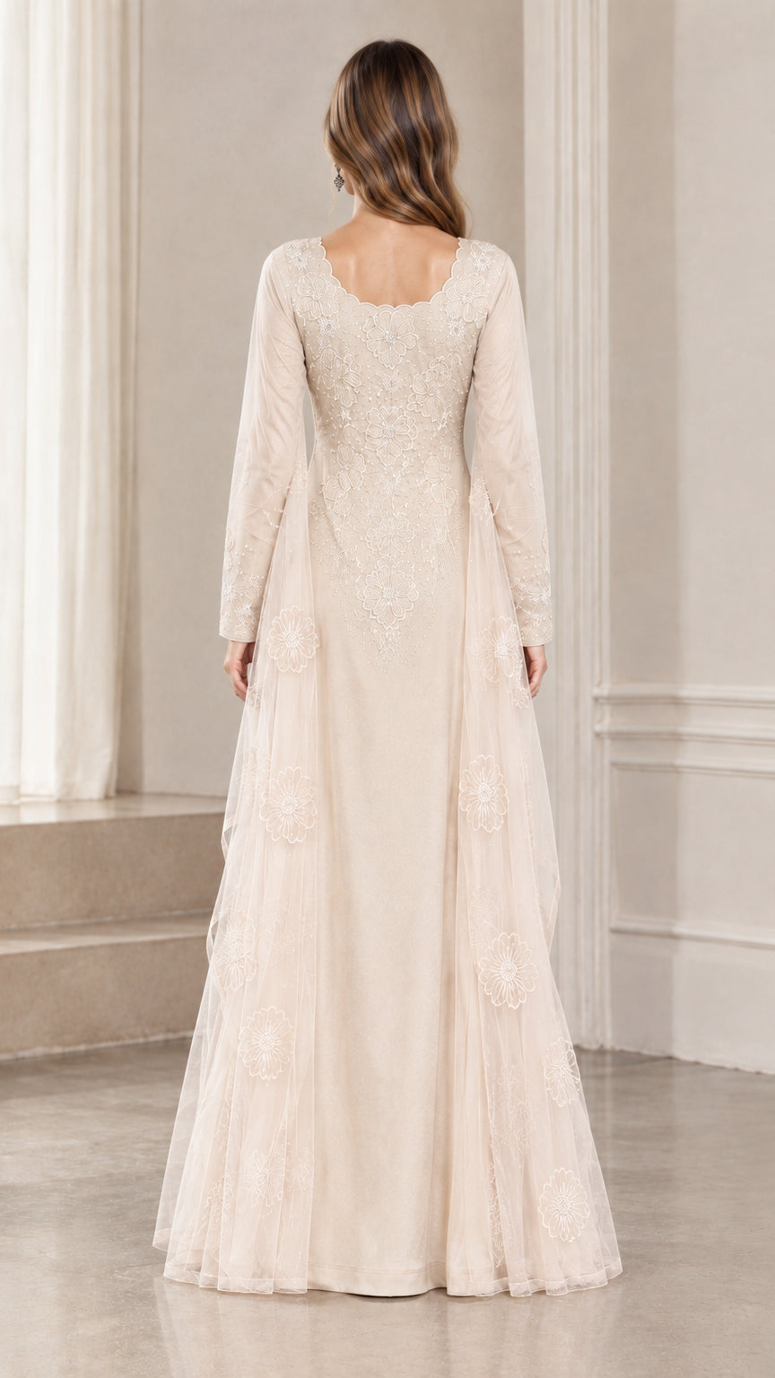 Back view of champagne formal evening dress showing flowing sheer cape back