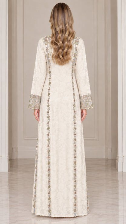 Back full-length view of ivory embroidered kaftan dress showing back panel embroidery