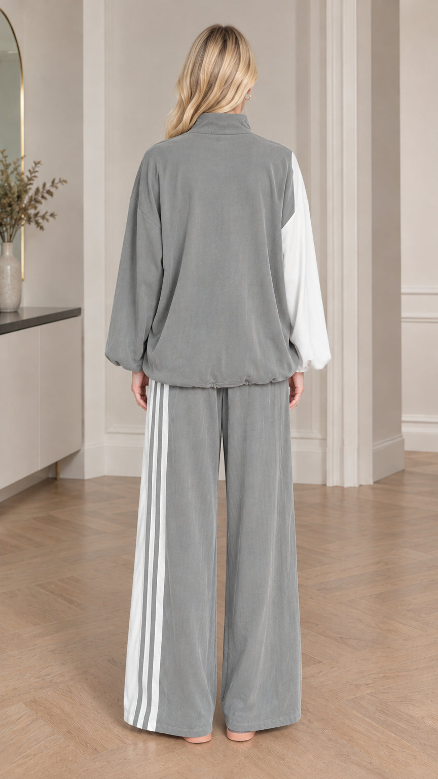 Back view of woman wearing grey colorblock loungewear set