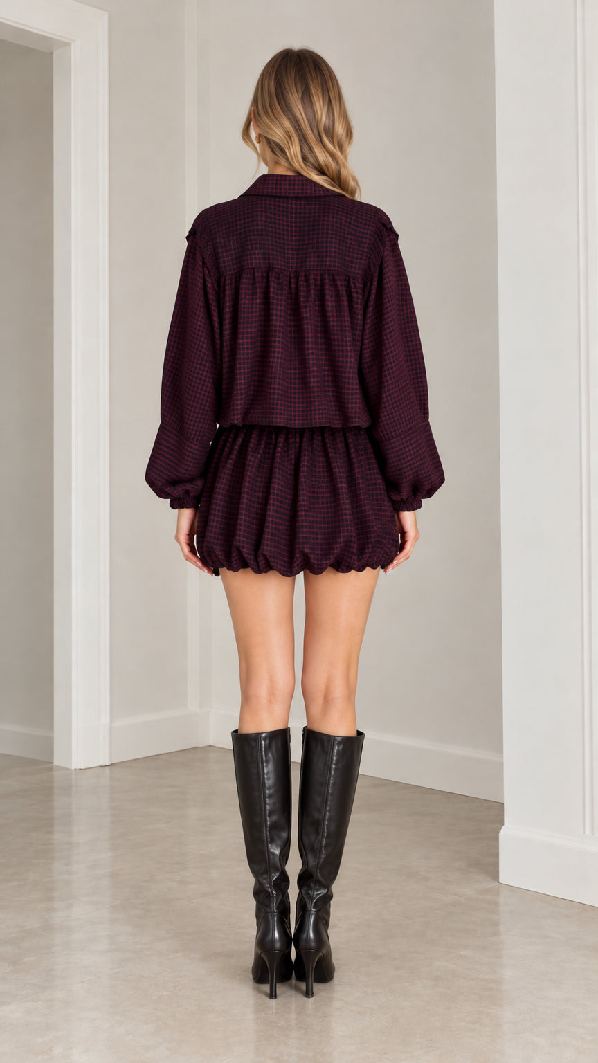 Model wearing Burgundy textured zip jacket and balloon shorts set back view