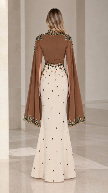 Back view of two-tone brown and cream jeweled cape dress