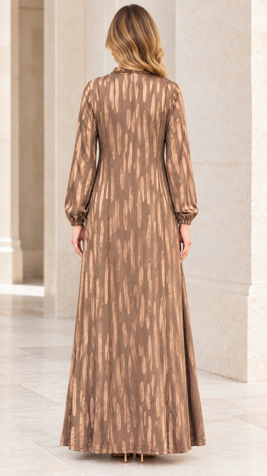 Back view of woman wearing Bronze patterned long sleeve maxi dress