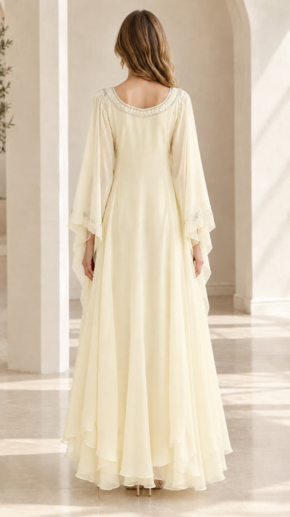 Back view of floor-length ivory chiffon maxi dress