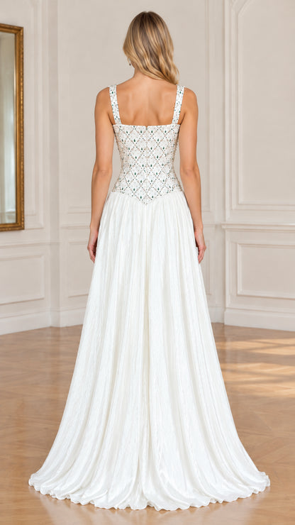 Back view of model in white beaded bodice pleated evening gown