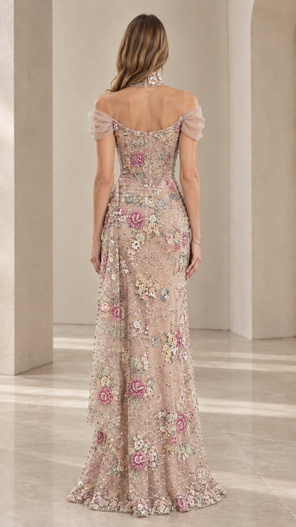 Back view of model wearing Champagne floral beaded formal dress with draped tulle sleeves