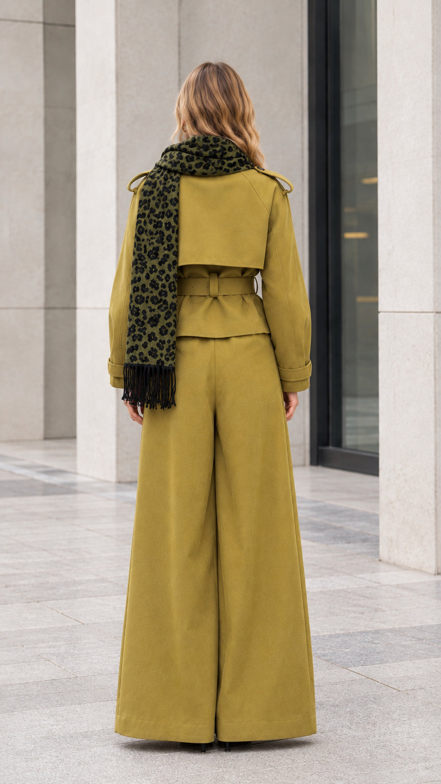 Back view of olive green cropped trench jacket with wide leg pants