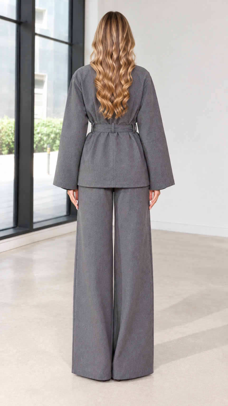 Back view of women's grey two-piece wide-leg pant suit set