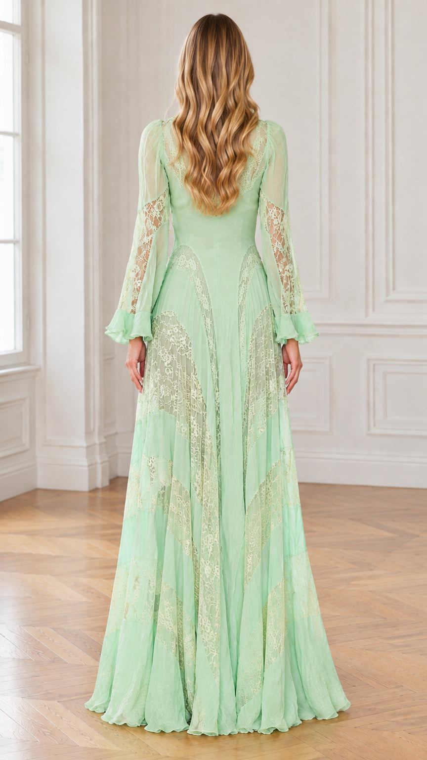 Back full-length view of mint green flowy maxi dress showing lace details