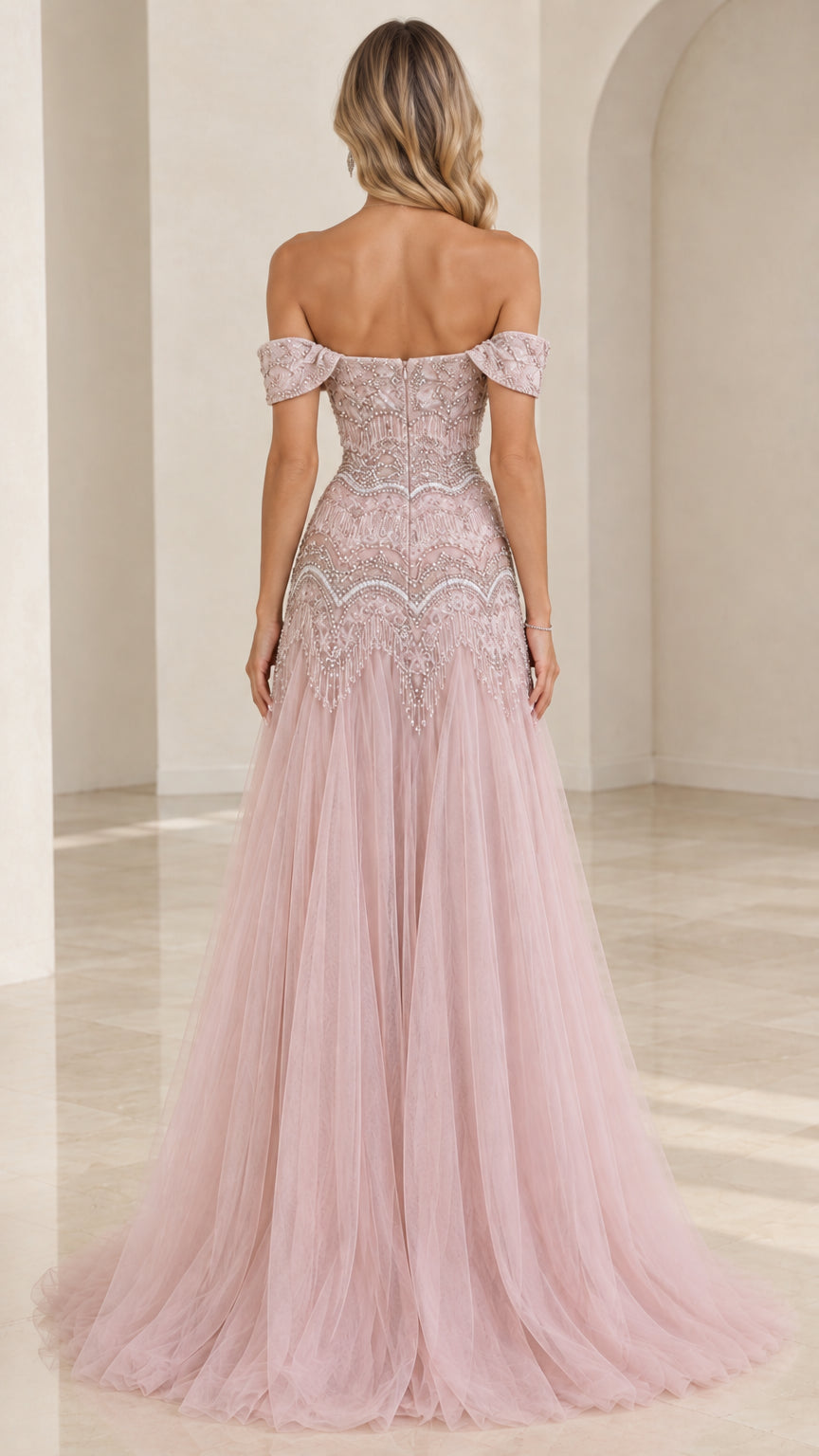 Back view of dusty pink off-shoulder evening gown with tulle skirt