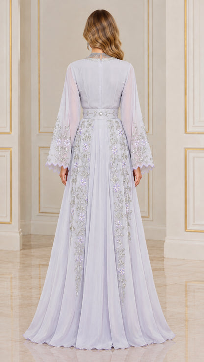 Back view of model wearing lilac floor-length embellished evening gown