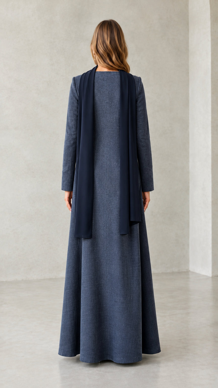 Back view of model wearing Slate Blue maxi dress with draped scarf