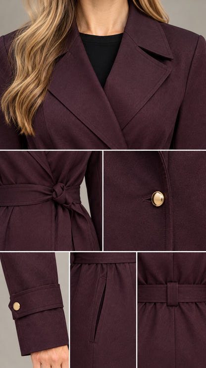 Close-up details of collar, belt knot, gold button, and sleeve cuff on burgundy coat
