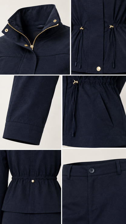 Close-up details of gold zipper, waist drawstring toggles, cuffs, and pockets