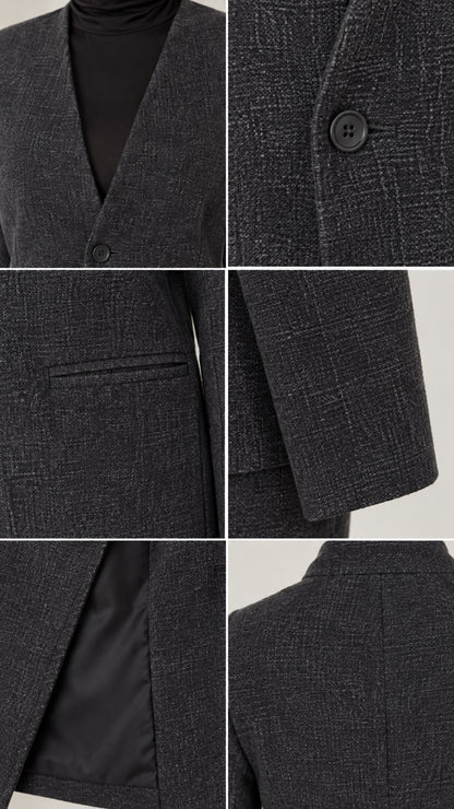 Close-up details of Charcoal Grey suit fabric, single button closure, pockets, and smooth inner lining