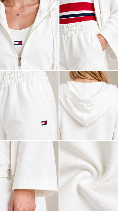 Close-up details of zipper, hood, tricolor band, and soft fabric texture on 3-piece tracksuit