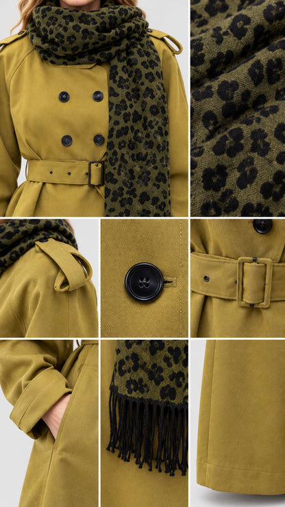Close-up details of olive green trench jacket buttons belt and cuff accents