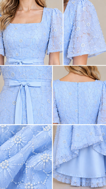 Close-up details of embroidered floral texture, flutter sleeve, waist ribbon, and hem lining