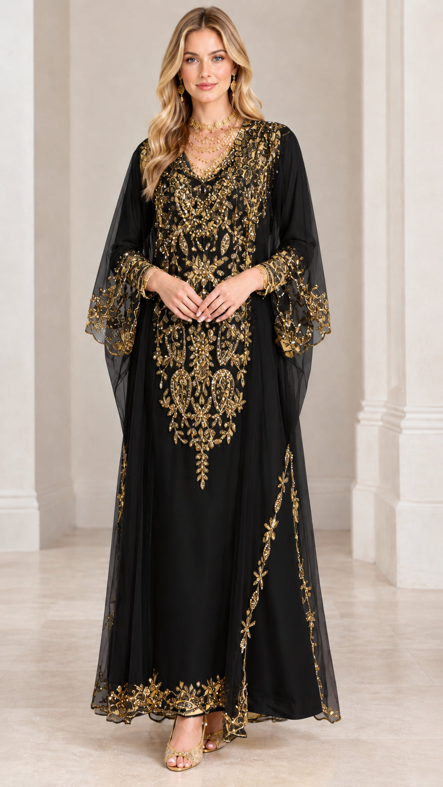 Front view of black floor-length kaftan dress with rich gold embroidery