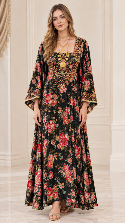 Front view of woman wearing black floral embroidered bell sleeve maxi dress