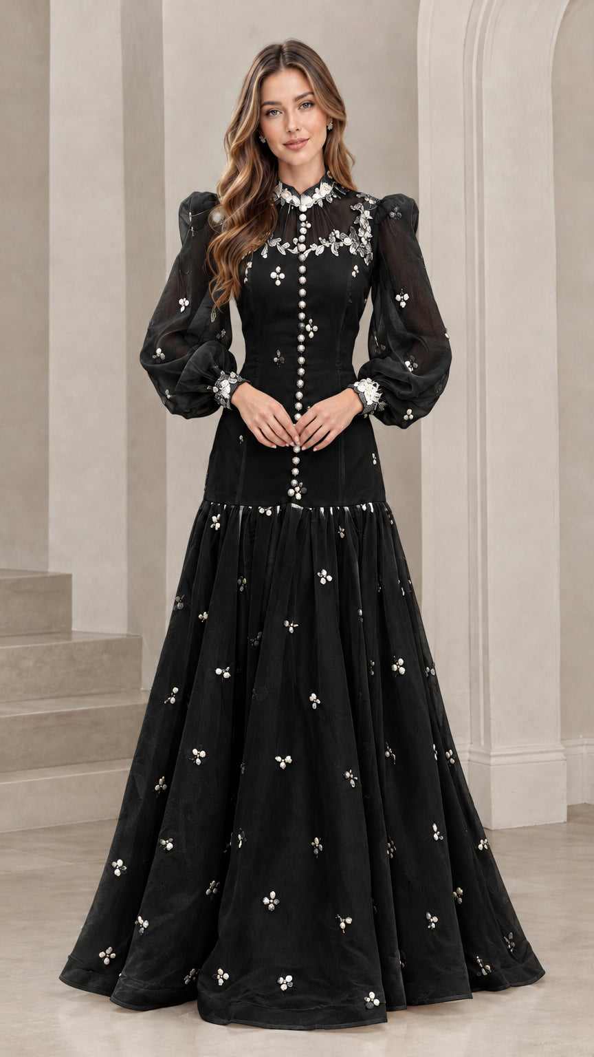 Front view of black long sleeve Victorian lace maxi gown with white floral appliques