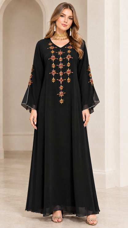 Full-length front view of model wearing Black embroidered maxi abaya dress