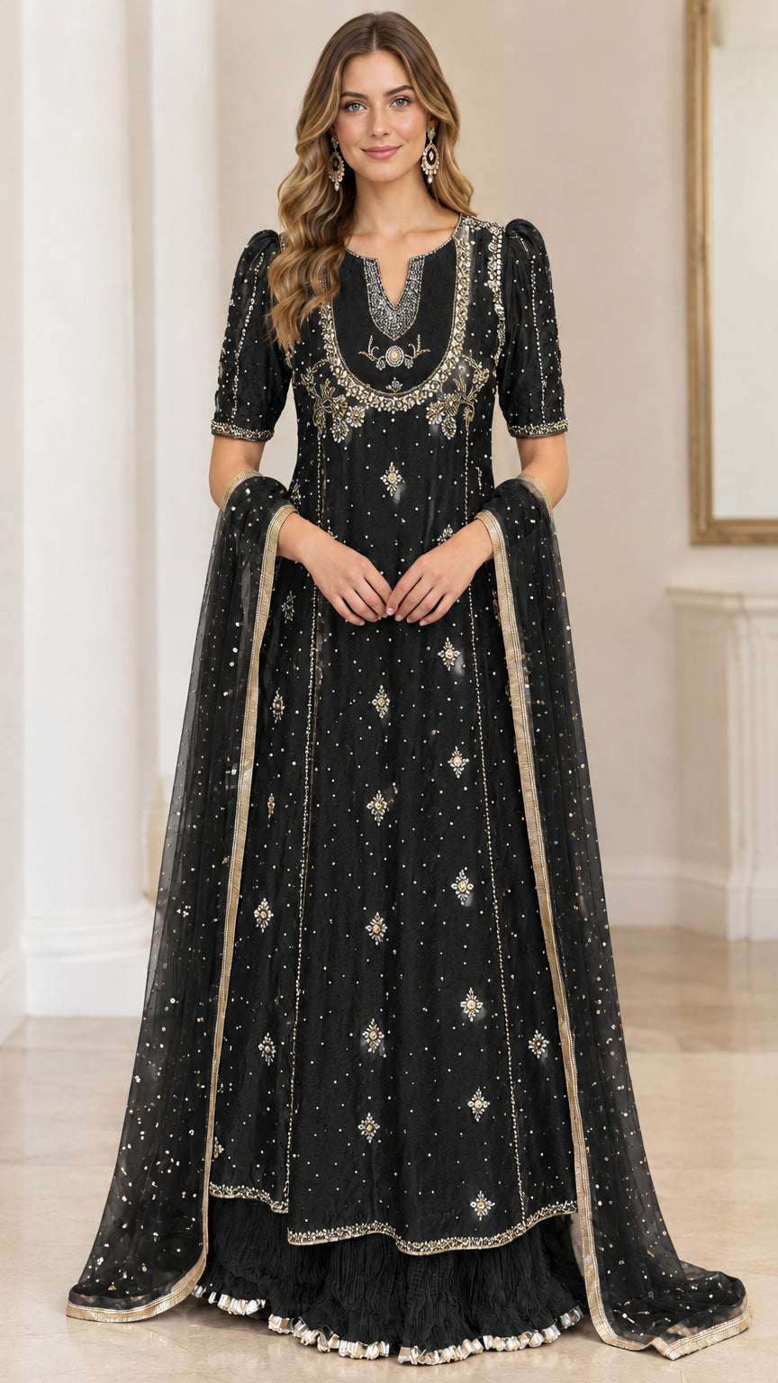 Black embroidered floor-length gown with metallic gold accents and dupatta