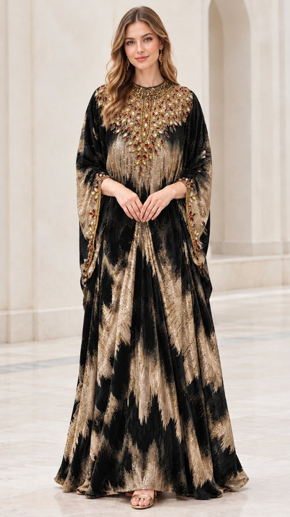 Model wearing Black and gold textured velvet kaftan dress