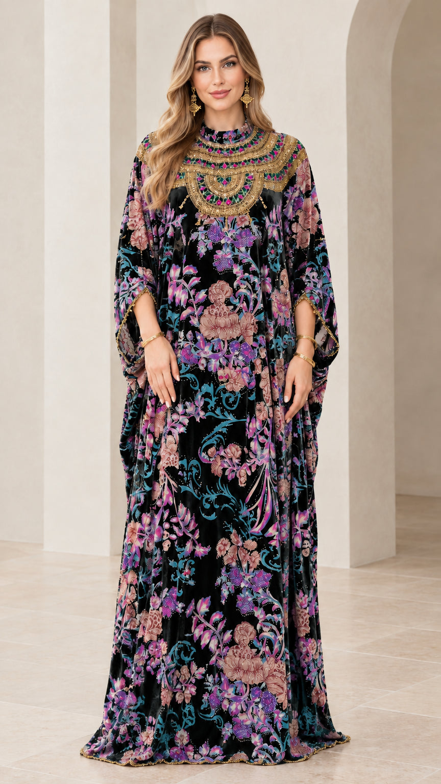 Front view of black floral velvet kaftan maxi dress with embellished neckline