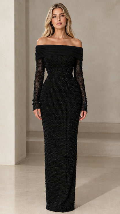 Model wearing black off-the-shoulder pearl embellished long sleeve column maxi dress