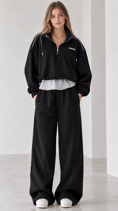 Women's black two-piece half-zip sweatshirt and wide-leg sweatpants set