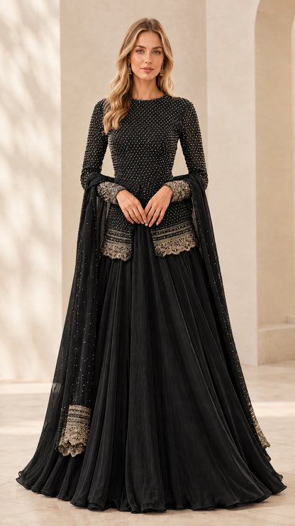 Front full view of black embellished long sleeve peplum top and pleated maxi skirt set