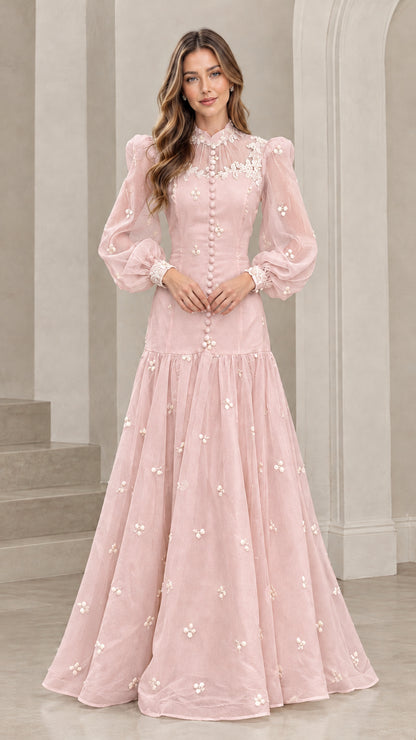 Front view of blush pink long sleeve Victorian lace maxi gown with white floral details