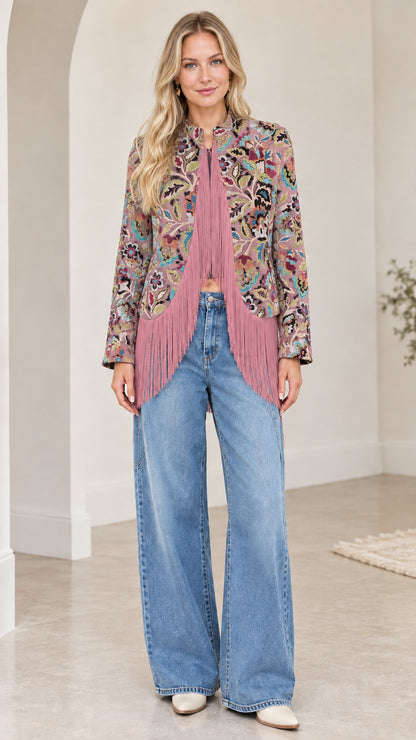 Model wearing dusty pink and mauve floral jacquard fringe jacket