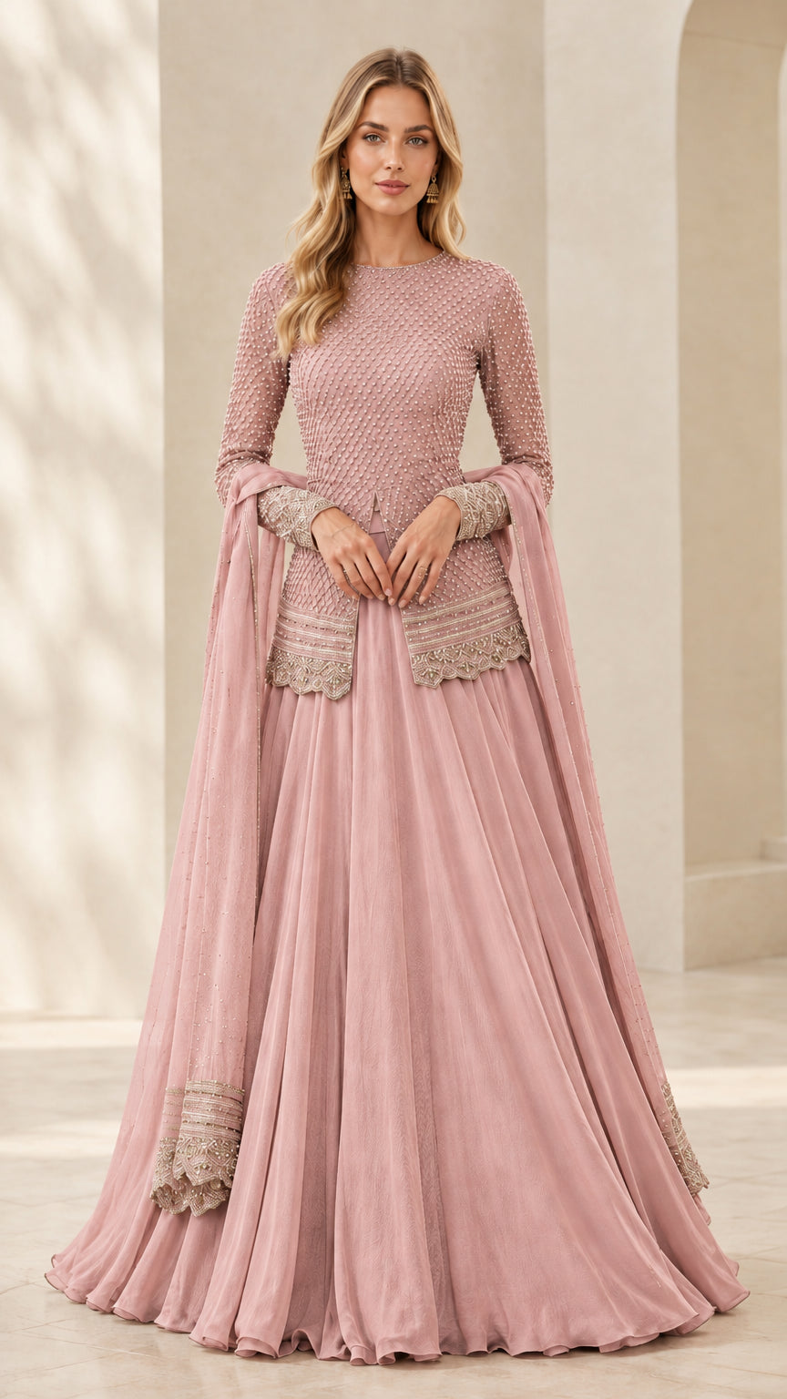 Front full view of dusty pink embroidered long sleeve peplum top and pleated maxi skirt set