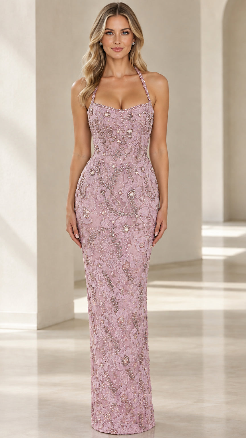 Front view of woman wearing Dusty Rose embroidered halter column evening gown