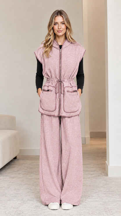 Model wearing dusty pink 2-piece hooded vest and wide-leg pants set