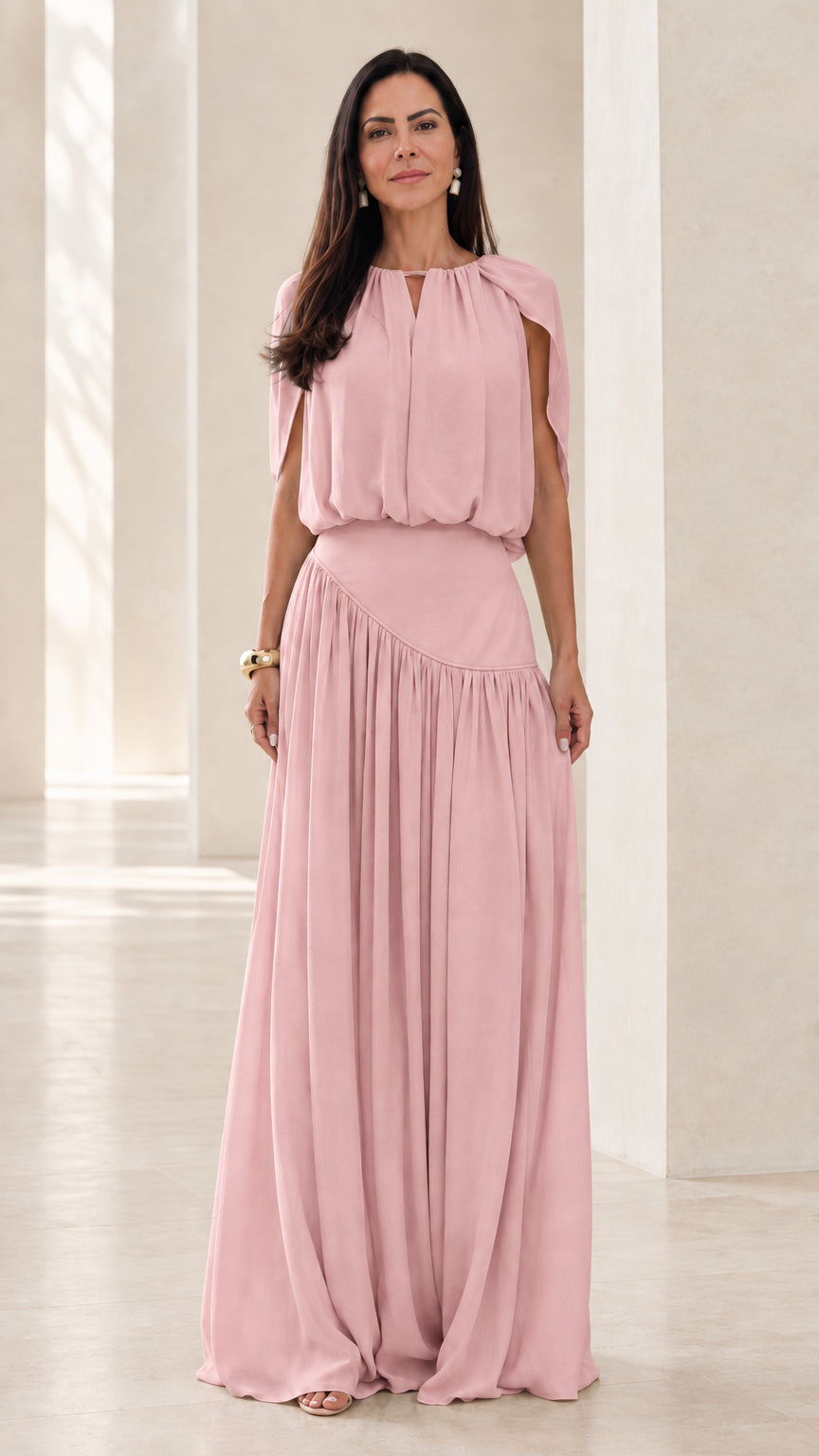 Front view of model wearing Blush Pink cape sleeve asymmetrical maxi dress