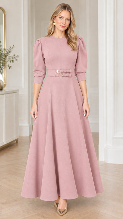 Model wearing dusty pink puff sleeve double buckle belted maxi dress