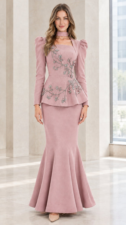 Model wearing Dusty Pink long sleeve peplum evening dress