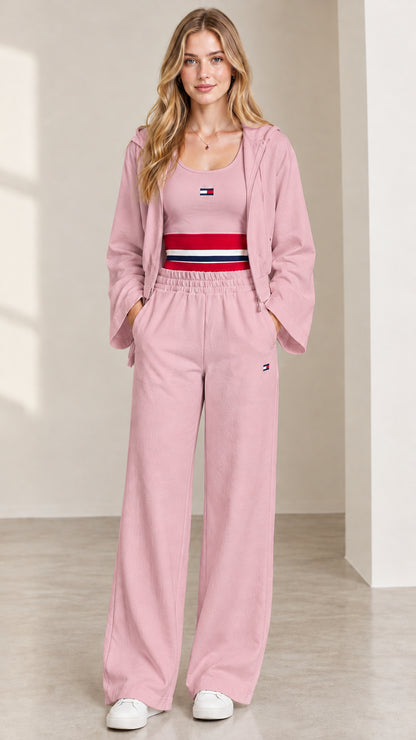 Women's 3-piece lounge set in dusty pink with cropped hoodie, tank, and wide leg pants