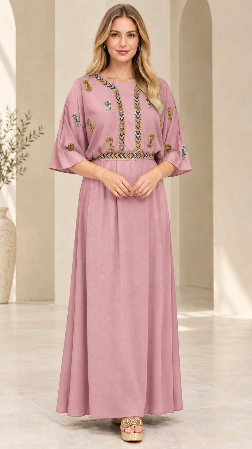 Front view of model wearing the dusty pink embellished kaftan maxi dress