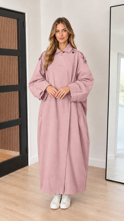 Full-length front view of dusty pink longline trench duster coat on model