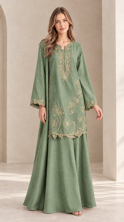 Full front view of model in sage green embroidered tunic and maxi skirt set
