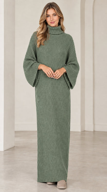 Full front view of model wearing sage green turtleneck ribbed maxi sweater dress
