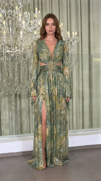 Model wearing Sage Green Multi metallic plissé cutout long sleeve evening gown