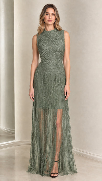 Front full-length view of woman in Sage Green high neck beaded fringe evening gown