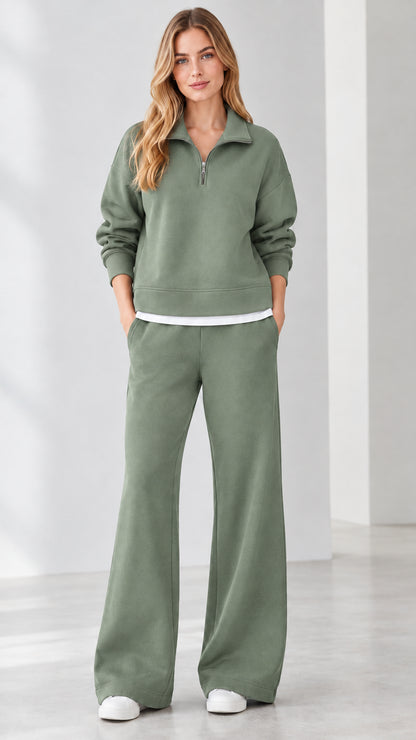 Front view of model wearing sage green half-zip loungewear set with wide-leg bottoms